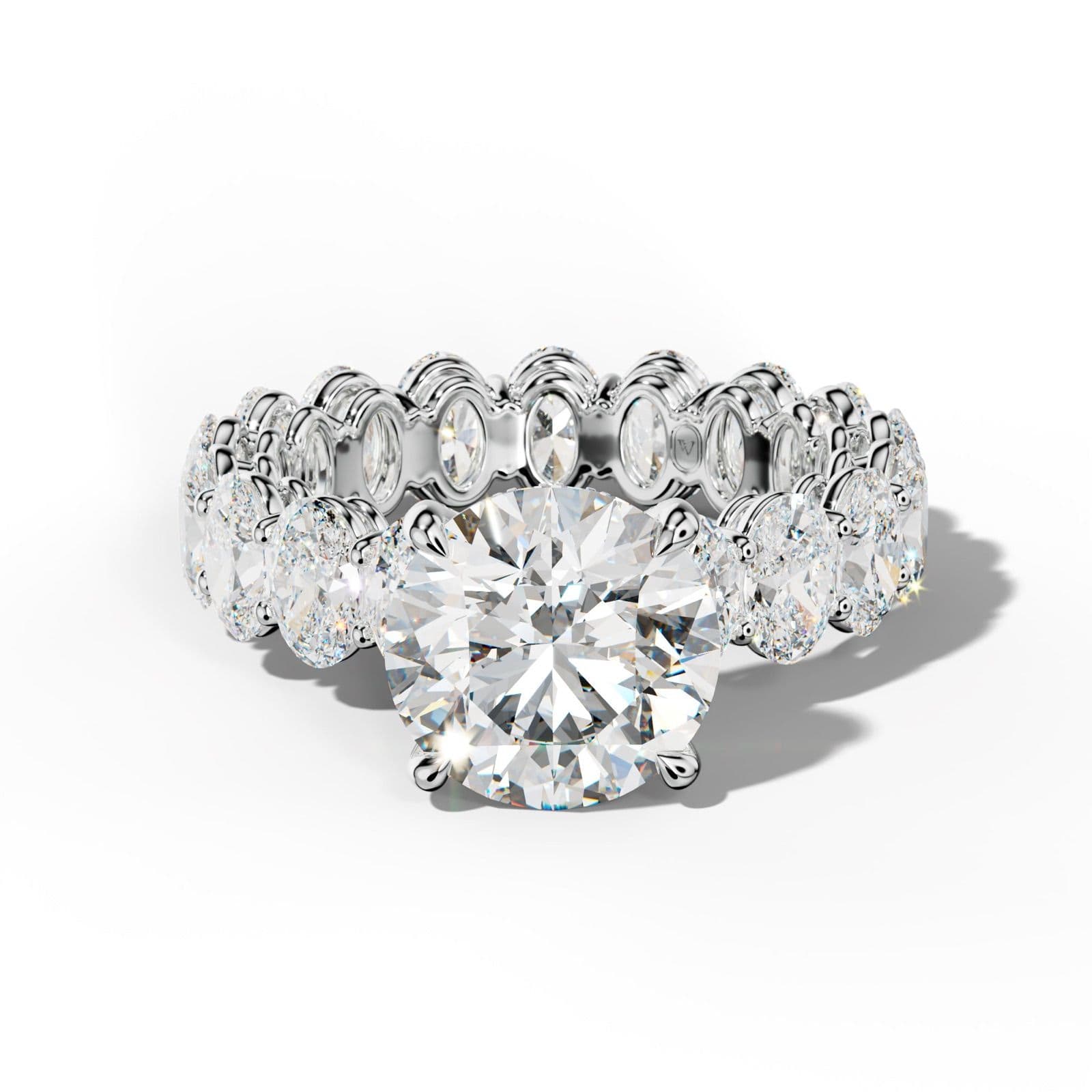 Amoura Round Diamond Engagement Ring With Oval Side Stones