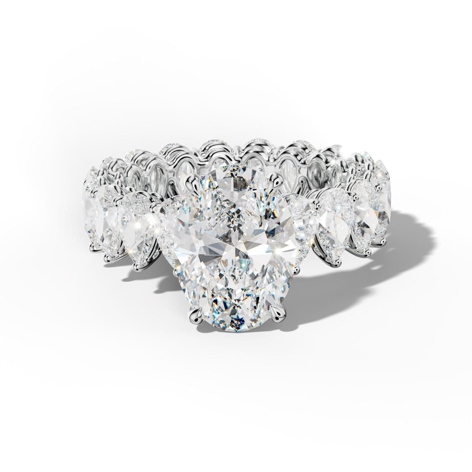 Maya Oval Diamond Engagement Ring With Pear Shape Side Stones