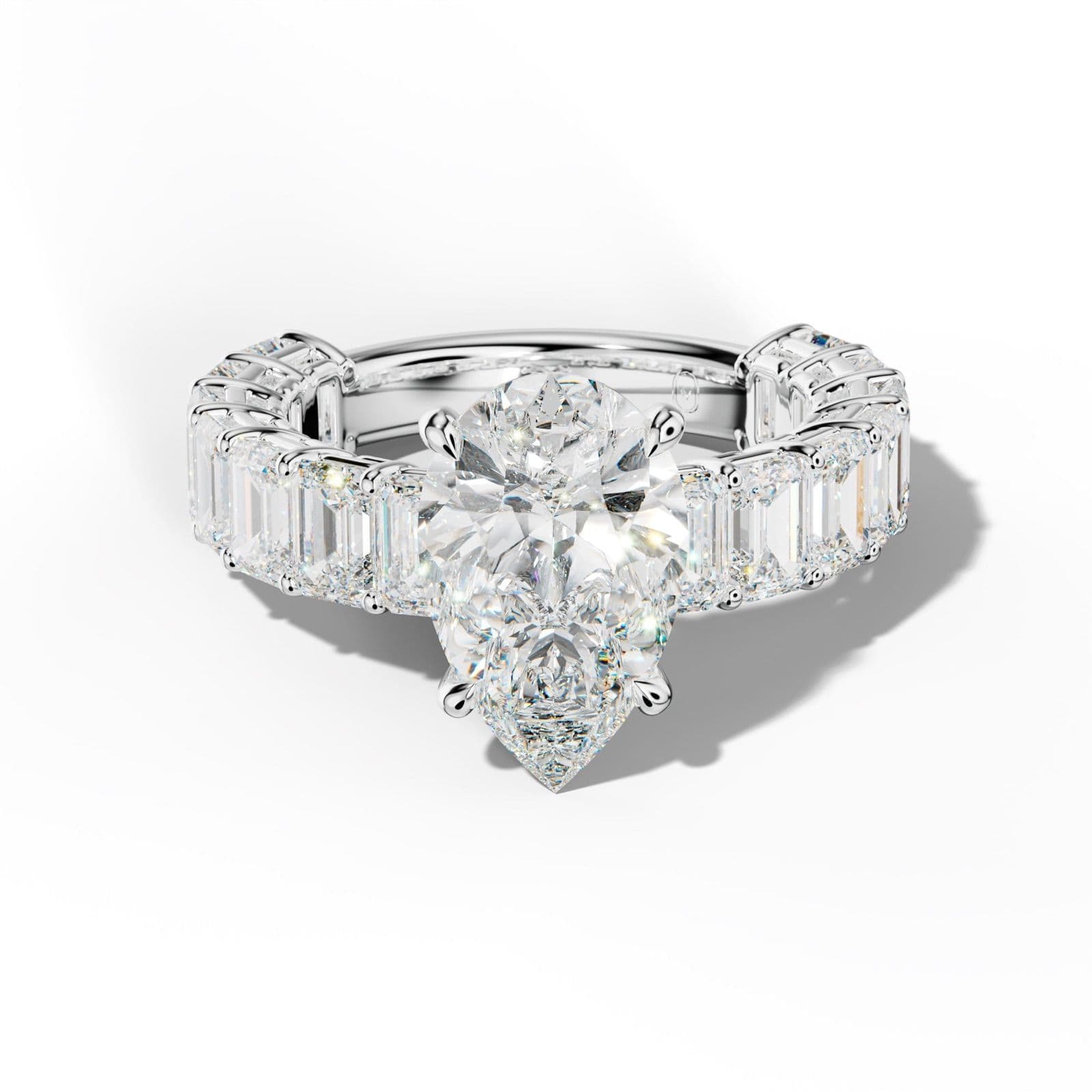 Mina Pear Shape Engagement Ring With Emerald Cut Side Stones