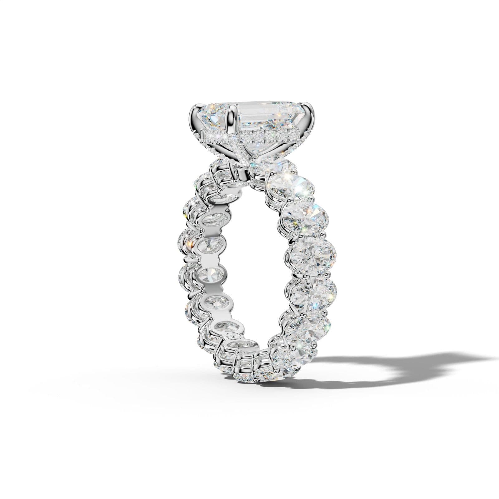 Amoura Emerald Cut Engagement Ring With Oval Side Stones