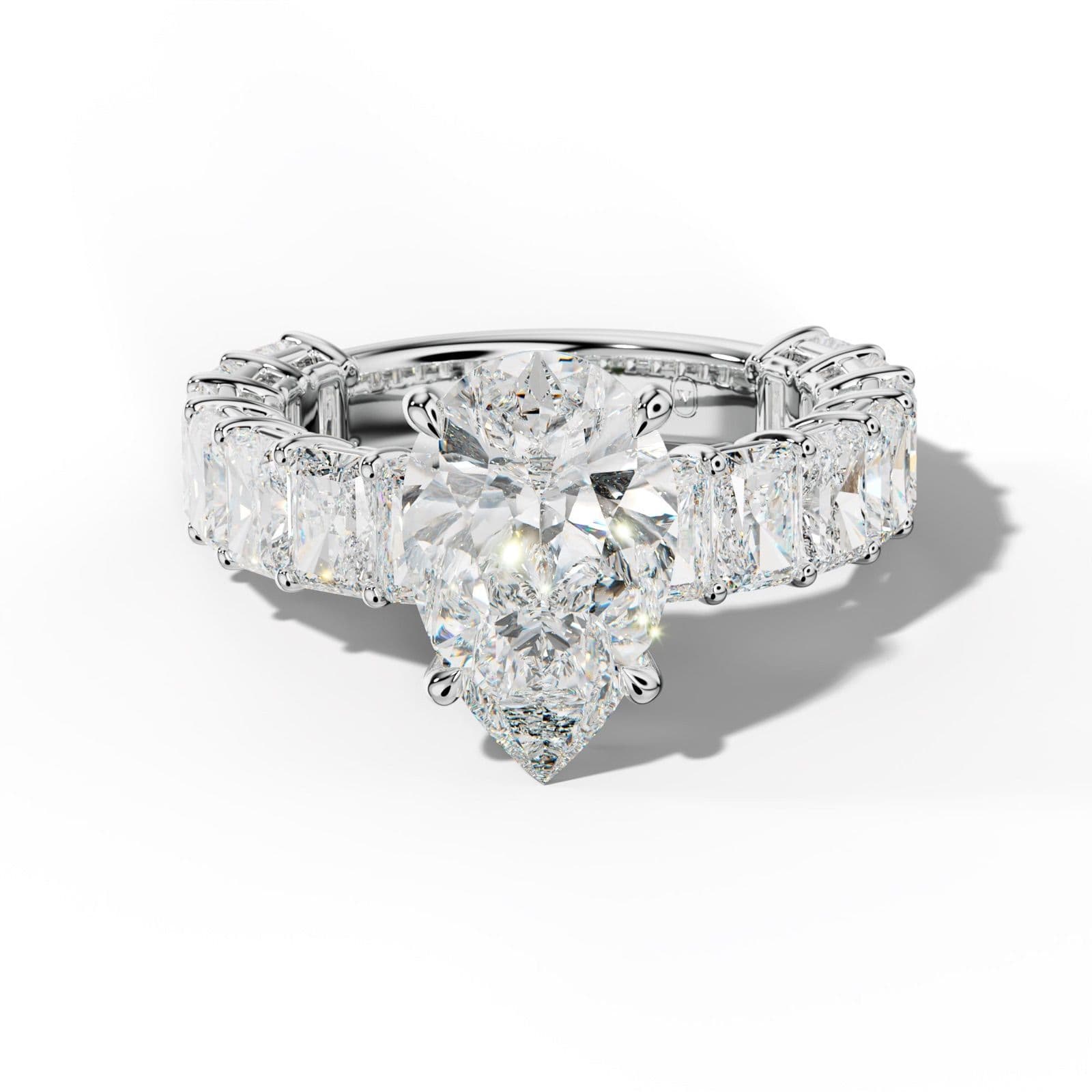 Naomi Pear Shape Engagement Ring With Radiant Side Stones