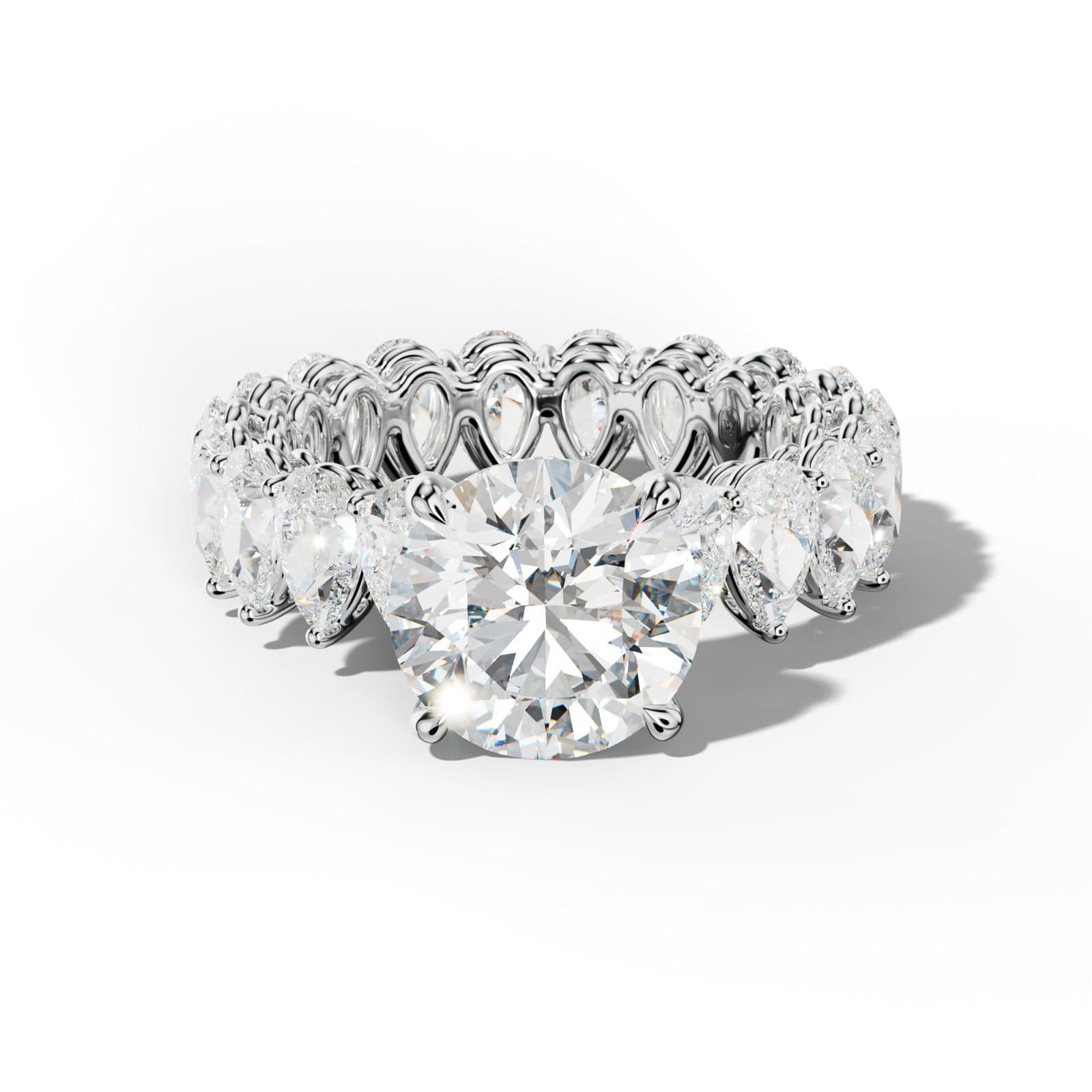 Maya Round Diamond Engagement Ring With Pear Shape Side Stones