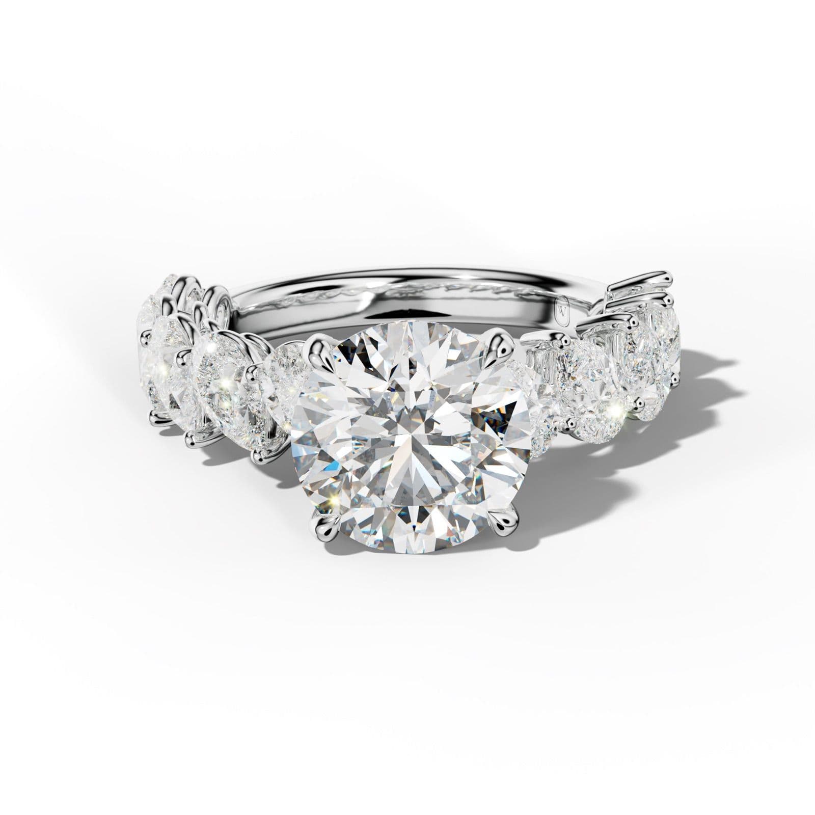 Elisabeth Round Diamond Engagement Ring With Slanted Pear Side Stones