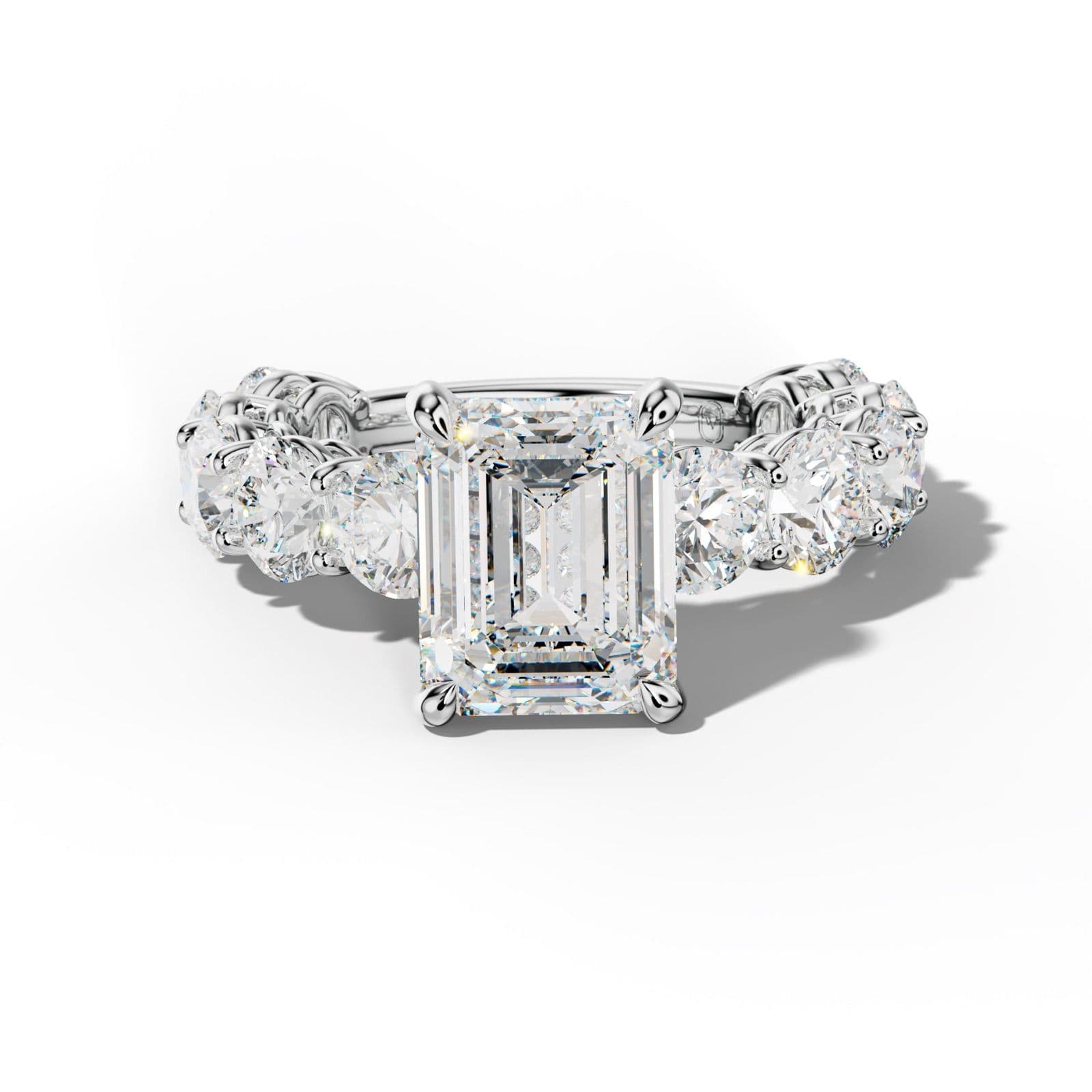 Johanna Emerald Cut Engagement Ring With Round Side Stones