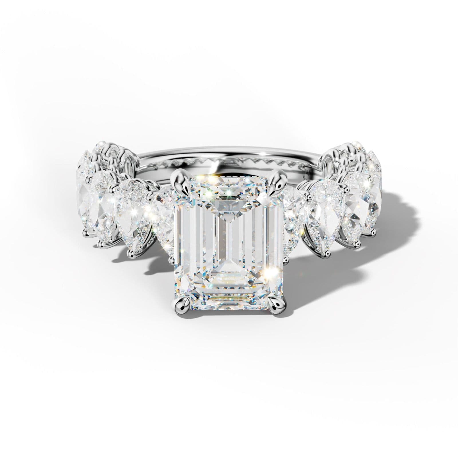 Remi Emerald Cut Diamond Engagement Ring With Pear Shape Side Stones