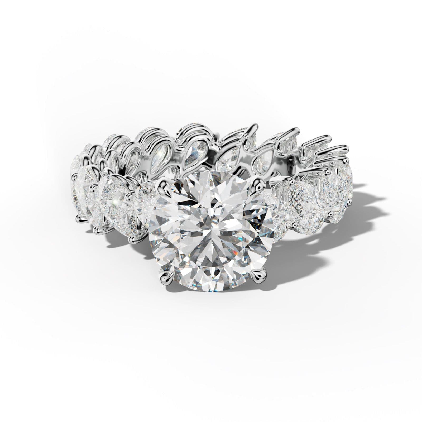 Quinn Round Diamond Engagement Ring With Slanted Pear Side Stones