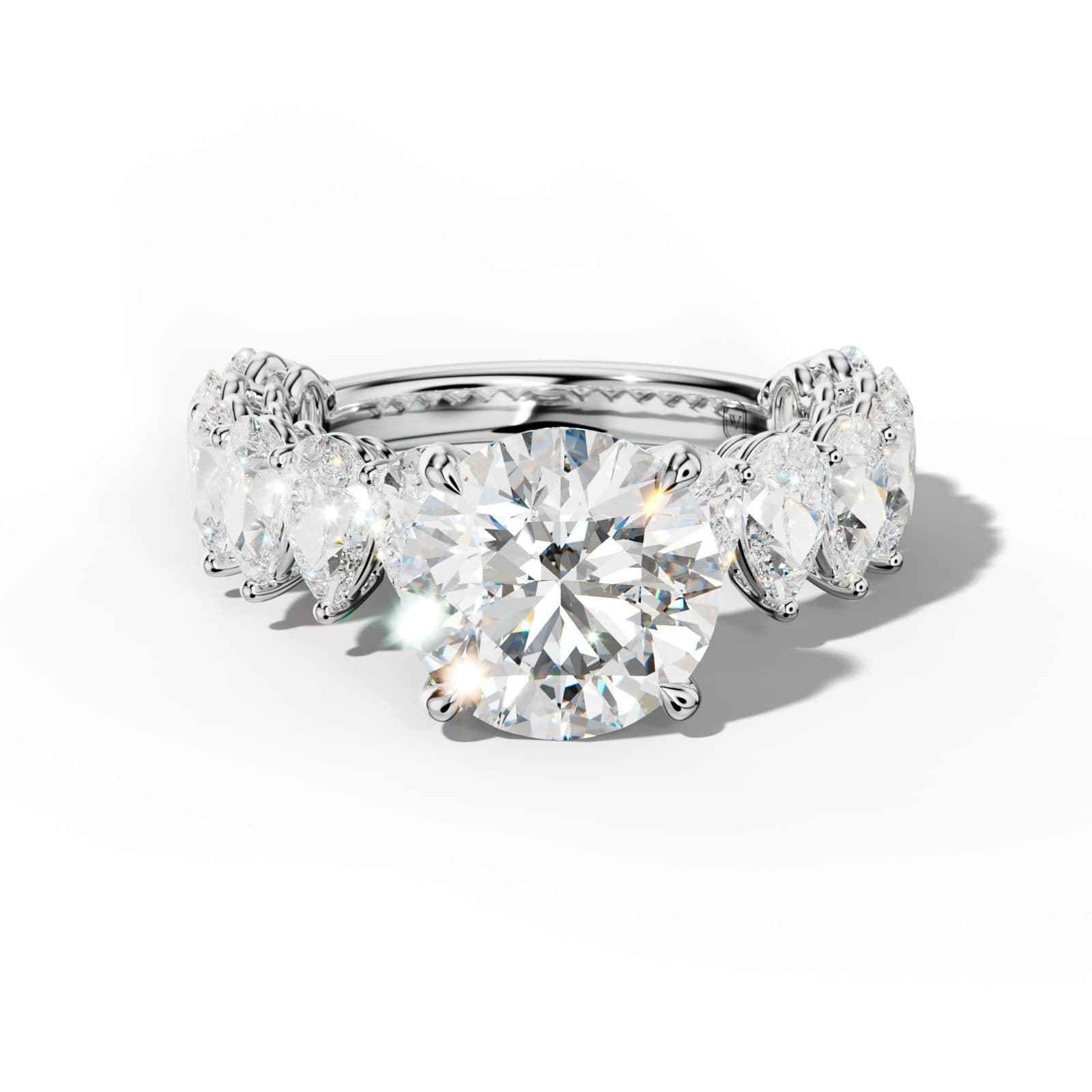 Remi Round Diamond Engagement Ring With Pear Shape Side Stones